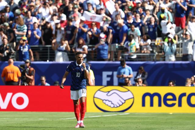 France's forward #10 Kylian Mbappe celebrates after scoring his team's first goal during the 2026 World Cup Group I football match between France and Senegal at the New York/New Jersey Stadium in East Rutherford on June 16, 2026.  (Photo by FRANCK FIFE / AFP)