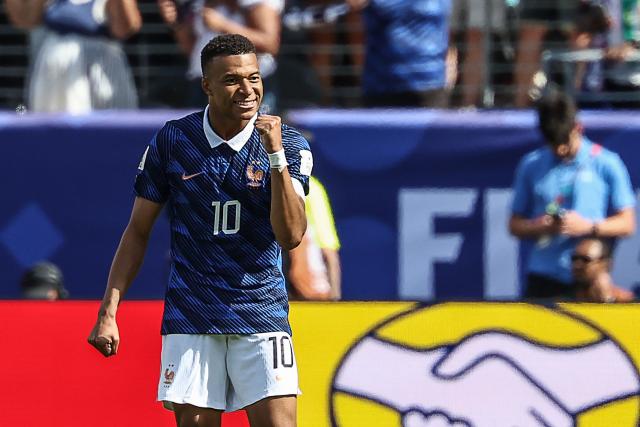 France's forward #10 Kylian Mbappe celebrates after scoring his team's first goal during the 2026 World Cup Group I football match between France and Senegal at the New York/New Jersey Stadium in East Rutherford on June 16, 2026.  (Photo by FRANCK FIFE / AFP)