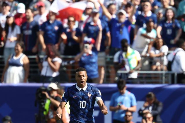 France's forward #10 Kylian Mbappe celebrates after scoring his team's first goal during the 2026 World Cup Group I football match between France and Senegal at the New York/New Jersey Stadium in East Rutherford on June 16, 2026.  (Photo by FRANCK FIFE / AFP)