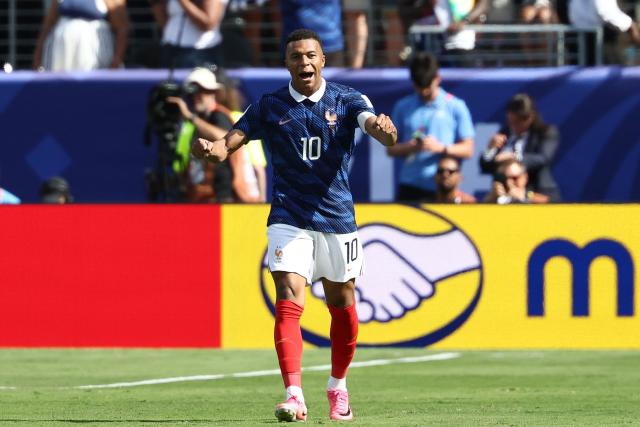 France's forward #10 Kylian Mbappe celebrates after scoring his team's first goal during the 2026 World Cup Group I football match between France and Senegal at the New York/New Jersey Stadium in East Rutherford on June 16, 2026.  (Photo by FRANCK FIFE / AFP)