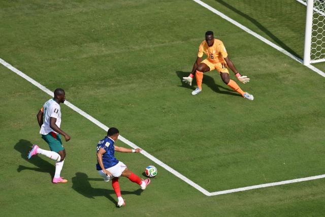 France's forward #10 Kylian Mbappe scores his team's first goal with teammates during the 2026 World Cup Group I football match between France and Senegal at the New York/New Jersey Stadium in East Rutherford on June 16, 2026. (Photo by Angela WEISS / AFP)