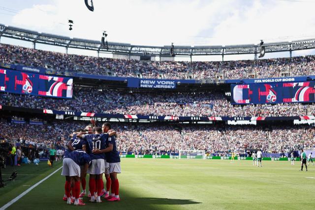 France players celebrate their team's second goal during the 2026 World Cup Group I football match between France and Senegal at the New York/New Jersey Stadium in East Rutherford on June 16, 2026.  (Photo by CHARLY TRIBALLEAU / AFP)