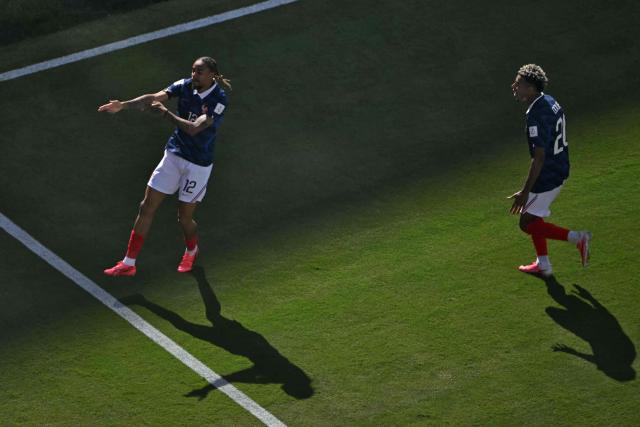 France's forward #12 Bradley Barcola celebrates scoring his team's second goal during the 2026 World Cup Group I football match between France and Senegal at the New York/New Jersey Stadium in East Rutherford on June 16, 2026. (Photo by Mauro PIMENTEL / AFP)