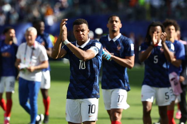 France's forward #10 Kylian Mbappe acknowledges the crowd after winning the 2026 World Cup Group I football match between France and Senegal at the New York/New Jersey Stadium in East Rutherford on June 16, 2026.  (Photo by FRANCK FIFE / AFP)