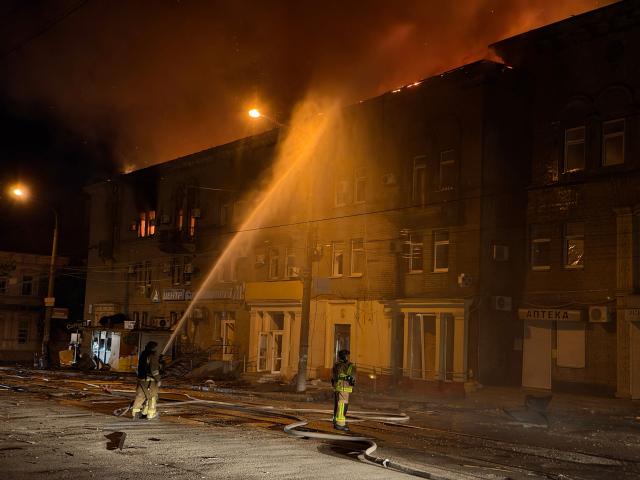 Firefighters try to put out a fire in a residential building following an airstrike in Zaporizhzhia on June 16, 2026, amid the Russian invasion of Ukraine. (Photo by Darya NAZAROVA / AFP)