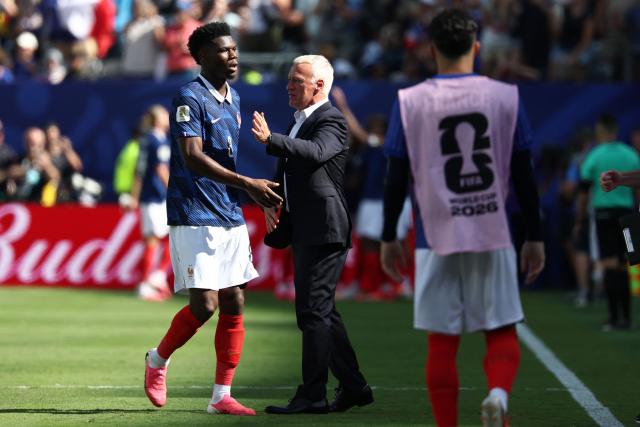 France's head coach Didier Deschamps talks to his midfielder #08 Aurelien Tchouameni during the 2026 World Cup Group I football match between France and Senegal at the New York/New Jersey Stadium in East Rutherford on June 16, 2026.  (Photo by FRANCK FIFE / AFP)