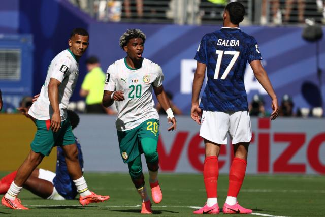 Senegal's forward #20 Ibrahim Mbaye celebrates after scoring his team's first goal during the 2026 World Cup Group I football match between France and Senegal at the New York/New Jersey Stadium in East Rutherford on June 16, 2026.  (Photo by FRANCK FIFE / AFP)