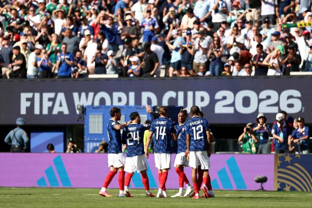 France players celebrate after winning the 2026 World Cup Group I football match between France and Senegal at the New York/New Jersey Stadium in East Rutherford on June 16, 2026.  (Photo by CHARLY TRIBALLEAU / AFP)