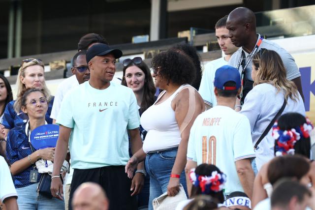 France's forward #10 Kylian Mbappe speaks with fans after the 2026 World Cup Group I football match between France and Senegal at the New York/New Jersey Stadium in East Rutherford on June 16, 2026.  (Photo by Franck FIFE / AFP)
