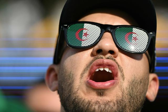 An Algerian fan gestures ahead of the 2026 World Cup Group J football match between Argentina and Algeria at the Kansas City Stadium in Kansas City on June 16, 2026.  (Photo by ROBERTO SCHMIDT / AFP)