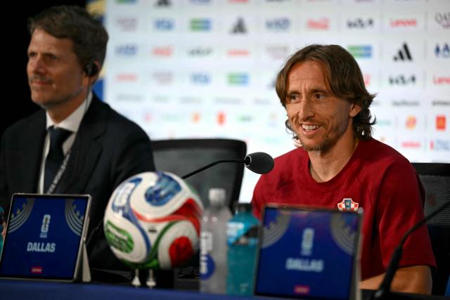 Croatia's midfielder #10 Luka Modric smiles as he gives a press conference at the Dallas Stadium in Arlington on June 16, 2026, on the eve of the 2026 World Cup Group L football match between England and Croatia. (Photo by Paul ELLIS / AFP)