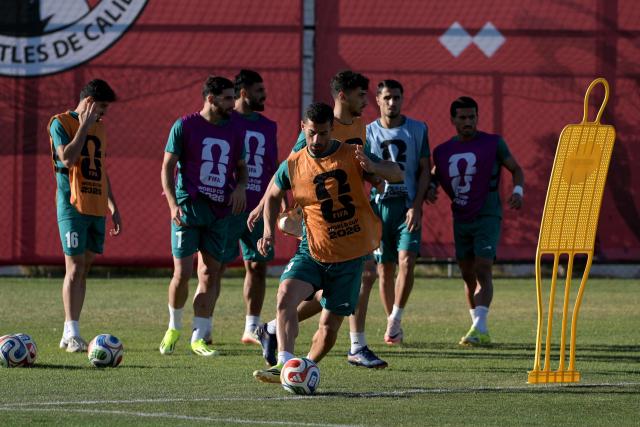Iran's defender #03 Ehsan Hajsafi and teammates take part in a training session during the 2026 World Cup football tournament at the Centro Xoloitzcuintle in Tijuana, Mexico on June 16, 2026. (Photo by Guillermo Arias / AFP)