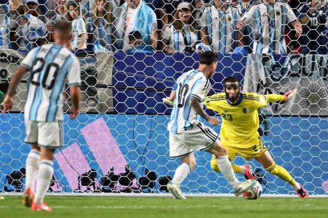 Argentina's forward #10 Lionel Messi shoots and scores his team's second goal during the 2026 World Cup Group J football match between Argentina and Algeria at the Kansas City Stadium in Kansas City on June 16, 2026.  (Photo by ROBERTO SCHMIDT / AFP)