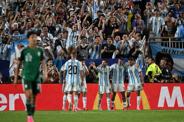 Argentina's forward #10 Lionel Messi celebrates with teammates scoring his team's third goal during the 2026 World Cup Group J football match between Argentina and Algeria at the Kansas City Stadium in Kansas City on June 16, 2026.  (Photo by ROBERTO SCHMIDT / AFP)