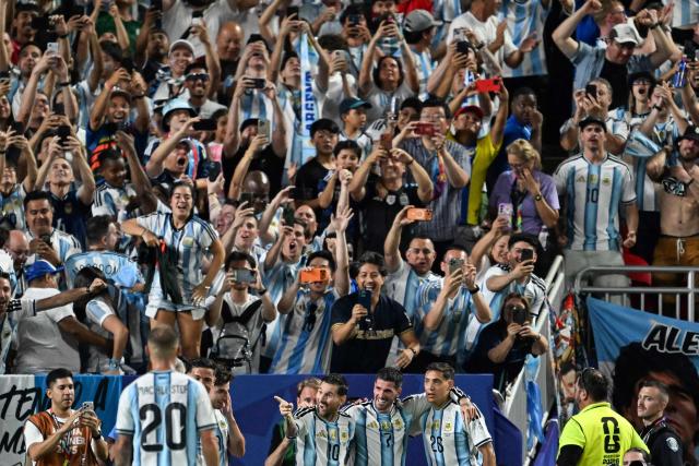 Argentina's forward #10 Lionel Messi celebrates with teammates celebrates scoring his team's third goal during the 2026 World Cup Group J football match between Argentina and Algeria at the Kansas City Stadium in Kansas City on June 16, 2026.  (Photo by ROBERTO SCHMIDT / AFP)