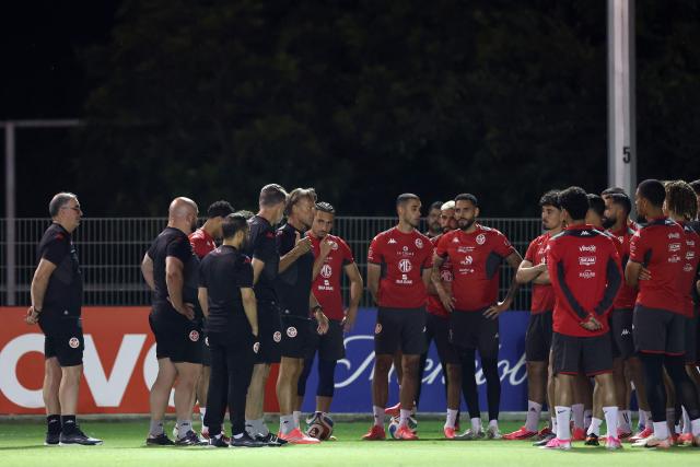 Tunisia's French head coach Herve Renard speaks to his players in a training session during the 2026 World Cup tournament at Rayados Training Centre in Santiago, Nueva Leon state, Mexico on June 16, 2026. (Photo by Julio Cesar AGUILAR / AFP)