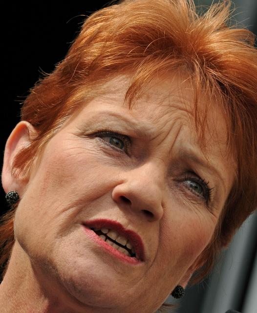 (FILES) Controversial former Australian politician Pauline Hanson speaks to the media in Sydney after narrowly failing in her bid to win a seat in the New South Wales parliament on April 12, 2011 in Sydney. The leader of Australia's ascendant far-right party assailed "radical Islam" and the media on June 17, 2026, and vowed to pull the country out of international organisations in an address briefly interrupted by the unfurling of a protest banner. (Photo by TORSTEN BLACKWOOD and GREG WOOD / AFP)