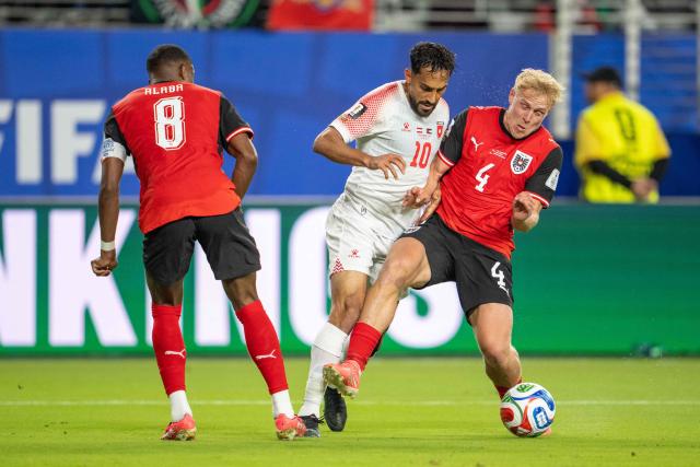 Austria's midfielder #04 Xaver Schlager and Jordan's forward #10 Mousa Altamari fight for the ball during the 2026 World Cup Group J football match between Austria and Jordan at the San Francisco Bay Area Stadium in Santa Clara, on June 16, 2026.  (Photo by GEORG HOCHMUTH / APA / AFP) / Austria OUT / SOUTH TYROL OUT