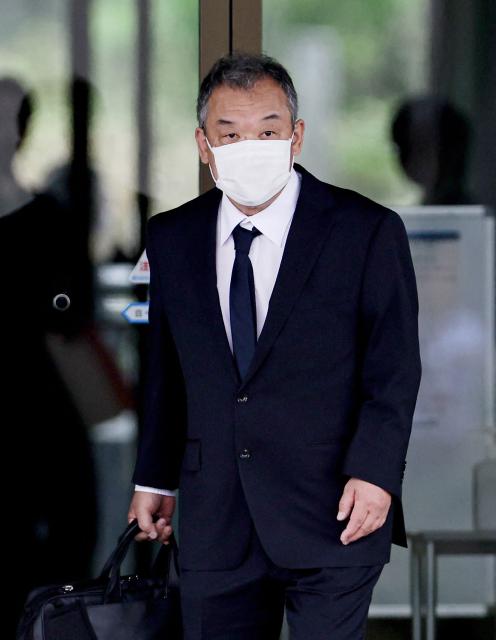 Seiichi Katsurada, president of a Japanese sightseeing boat company whose vessel Kazu I was involved in a deadly 2022 accident, enters the Kushiro District court for sentencing in Kushiro City on June 17, 2026. The head of a Japanese sightseeing boat company whose vessel capsized in frigid waters in 2022, killing at least 20 people, was sentenced to five years in jail, the local court said on June 17. (Photo by JIJI Press / AFP) / Japan OUT
