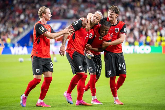 Austria's forward #07 Marko Arnautovic (C/L), celebrates with Austria's midfielder #21 Patrick Wimmer, Austria's midfielder #17 Carney Chukwuemeka and Austria's midfielder #24 Paul Wanner after scoring a penalty shot during the 2026 World Cup Group J football match between Austria and Jordan at the San Francisco Bay Area Stadium in Santa Clara, on June 16, 2026. (Photo by GEORG HOCHMUTH / APA / AFP) / Austria OUT / SOUTH TYROL OUT