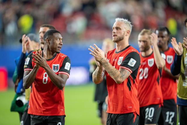 Austria's defender #08 David Alaba and Austria's forward #07 Marko Arnautovic applaud at the end of the 2026 World Cup Group J football match between Austria and Jordan at the San Francisco Bay Area Stadium in Santa Clara, on June 16, 2026. (Photo by GEORG HOCHMUTH / APA / AFP) / Austria OUT / SOUTH TYROL OUT