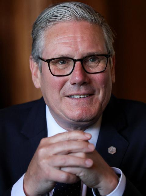 Britain's Prime Minister Keir Starmer speaks to members of the media on the sidelines of the G7 summit, in Thonon-les-Bains, on June 17, 2026. (Photo by Isabel Infantes / POOL / AFP)