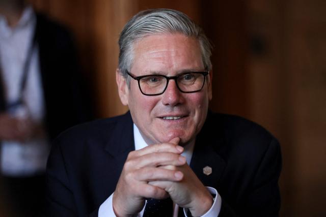 Britain's Prime Minister Keir Starmer speaks to members of the media on the sidelines of the G7 summit, in Thonon-les-Bains, on June 17, 2026. (Photo by Isabel Infantes / POOL / AFP)