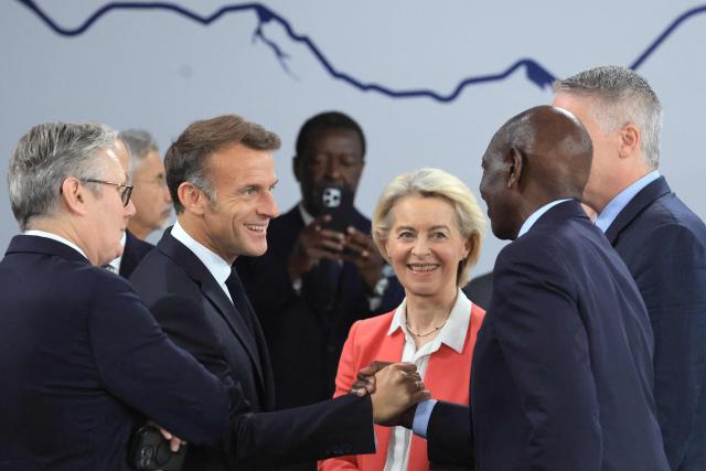 (From L) Britain's Prime Minister Keir Starmer, France's President Emmanuel Macron  European Commission President Ursula von der Leyen and Kenya's President William Ruto meet ahead of a morning work meeting to “revive balanced, inclusive, and sustainable economic growth for the benefit of all” in the presence of the G7 countries, partner countries, the International Monetary Fund, and the OECD, as part of the G7 summit, in Evian, eastern France, on June 17, 2026. G7 leaders will discuss on June 17, 2026, the security risks posed by AI and social media on the last day of a summit dominated by US the President, before host French President  dines with his US counterpart at the Palace of Versailles. The three-day summit of the leaders of Canada, France, Germany, Italy, Japan,B ritain and the United States has focused intensely on the US' deal to end the war with Iran and efforts to pressure Russia into brokering peace with Ukraine. (Photo by Ludovic MARIN / AFP)