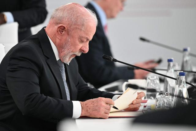 Brazil's President Luiz Inacio Lula da Silva attends a morning work meeting to “revive balanced, inclusive, and sustainable economic growth for the benefit of all” in the presence of the G7 countries, partner countries, the International Monetary Fund, and the OECD, as part of the G7 summit, in Evian, eastern France, on June 17, 2026. G7 leaders will discuss on June 17, 2026, the security risks posed by AI and social media on the last day of a summit dominated by US the President, before host French President  dines with his US counterpart at the Palace of Versailles. The three-day summit of the leaders of Canada, France, Germany, Italy, Japan,B ritain and the United States has focused intensely on the US' deal to end the war with Iran and efforts to pressure Russia into brokering peace with Ukraine. (Photo by Mandel NGAN / AFP)