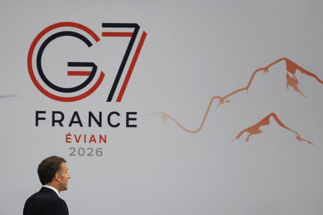 France's President Emmanuel Macron arrives to attend a morning work meeting to “revive balanced, inclusive, and sustainable economic growth for the benefit of all” in the presence of the G7 countries, partner countries, the International Monetary Fund, and the OECD, as part of the G7 summit, in Evian, eastern France, on June 17, 2026. G7 leaders will discuss on June 17, 2026, the security risks posed by AI and social media on the last day of a summit dominated by US the President, before host French President  dines with his US counterpart at the Palace of Versailles. The three-day summit of the leaders of Canada, France, Germany, Italy, Japan,B ritain and the United States has focused intensely on the US' deal to end the war with Iran and efforts to pressure Russia into brokering peace with Ukraine. (Photo by Ludovic MARIN / AFP)