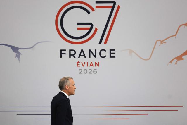 Canada’s Prime Minister Mark Carney arrives to attend a morning work meeting to “revive balanced, inclusive, and sustainable economic growth for the benefit of all” in the presence of the G7 countries, partner countries, the International Monetary Fund, and the OECD, as part of the G7 summit, in Evian, eastern France, on June 17, 2026. G7 leaders will discuss on June 17, 2026, the security risks posed by AI and social media on the last day of a summit dominated by US the President, before host French President  dines with his US counterpart at the Palace of Versailles. The three-day summit of the leaders of Canada, France, Germany, Italy, Japan,B ritain and the United States has focused intensely on the US' deal to end the war with Iran and efforts to pressure Russia into brokering peace with Ukraine. (Photo by Ludovic MARIN / AFP)