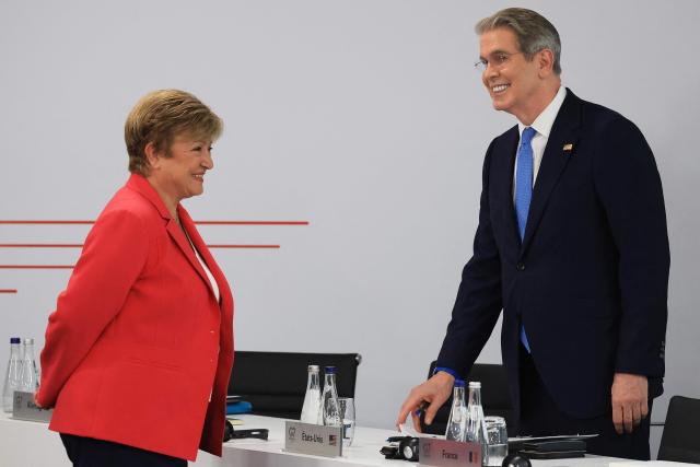 IMF Managing Director Kristalina Georgieva (L) speaks with US Secretary of Treasury Scott Bessent ahead of a morning work meeting to “revive balanced, inclusive, and sustainable economic growth for the benefit of all” in the presence of the G7 countries, partner countries, the International Monetary Fund, and the OECD, as part of the G7 summit, in Evian, eastern France, on June 17, 2026. G7 leaders will discuss on June 17, 2026, the security risks posed by AI and social media on the last day of a summit dominated by US the President, before host French President  dines with his US counterpart at the Palace of Versailles. The three-day summit of the leaders of Canada, France, Germany, Italy, Japan,B ritain and the United States has focused intensely on the US' deal to end the war with Iran and efforts to pressure Russia into brokering peace with Ukraine. (Photo by Ludovic MARIN / AFP)