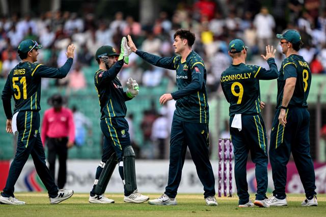 Australia's Matt Renshaw (C) celebrates with teammates after taking the wicket of Bangladesh's Saif Hassan during the first Twenty20 (T20) international cricket match between Bangladesh and Australia at the Bir Sreshtho Flight Lieutenant Matiur Rahman Stadium in Chattogram on June 17, 2026. (Photo by AFP)