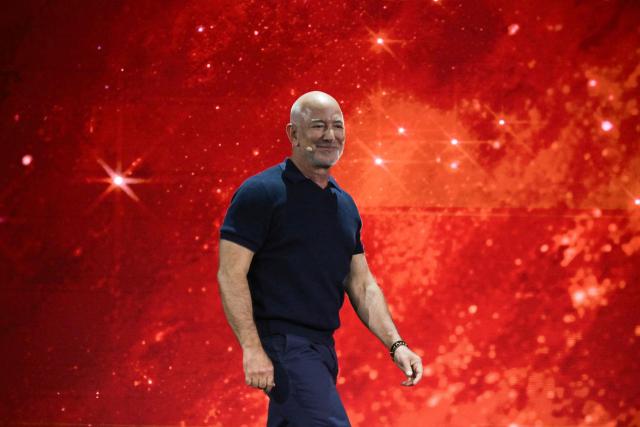 US Amazon's founder Jeff Bezos arrives on stage at the VivaTech technology startups and innovation fair at the Paris Expo Porte de Versailles, in Paris on June 17, 2026. (Photo by JULIEN DE ROSA / AFP)