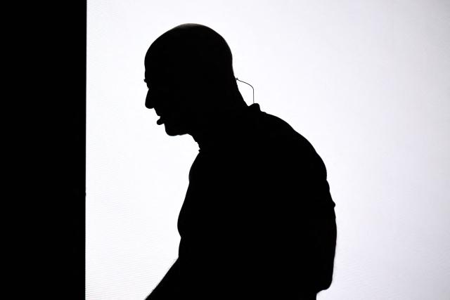 This photograph shows the silhouette of US Amazon's founder Jeff Bezos on stage at the VivaTech technology startups and innovation fair at the Paris Expo Porte de Versailles, in Paris on June 17, 2026. (Photo by JULIEN DE ROSA / AFP)
