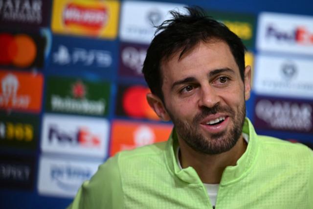 (FILES) Manchester City's Portuguese midfielder #20 Bernardo Silva attends a press conference at the Etihad Campus training ground in Manchester, north-west England, on March 16, 2026, on the eve of their UEFA Champions League, Last 16, second-leg football match against Real Madrid. Real Madrid announced on June 17, 2026 the signing of Portuguese international Bernardo Silva for the next two seasons. (Photo by Paul ELLIS / AFP)