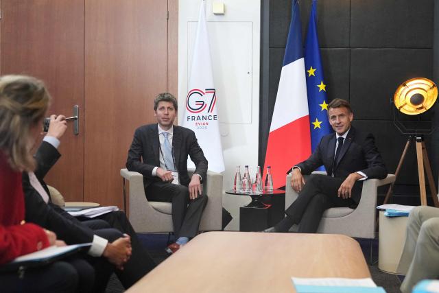 French President Emmanuel Macron (R) meets with the CEO of OpenAI Sam Altman (L) during a bilateral meeting on the sidelines of the G7 summit, in Evian, eastern France, on June 17, 2026. G7 leaders will discuss on June 17, 2026, the security risks posed by AI and social media on the last day of a summit dominated by US the President, before host French President  dines with his US counterpart at the Palace of Versailles. The three-day summit of the leaders of Canada, France, Germany, Italy, Japan,B ritain and the United States has focused intensely on the US' deal to end the war with Iran and efforts to pressure Russia into brokering peace with Ukraine. (Photo by Thibault Camus / POOL / AFP)