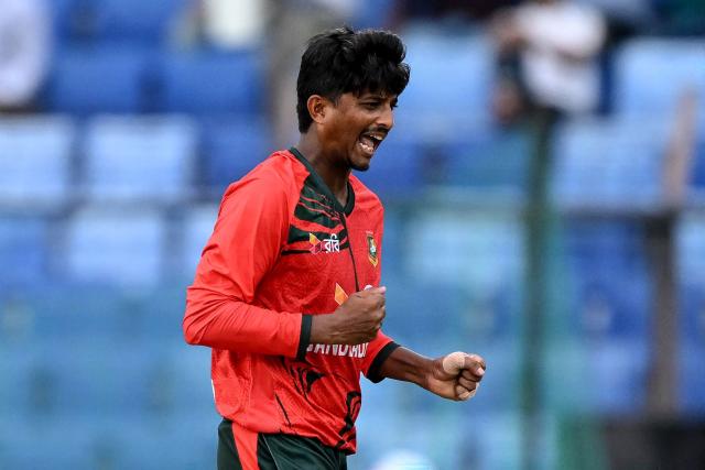 Bangladesh's Mahedi Hasan celebrates after taking the wicket of Australia's Tim David during the first Twenty20 (T20) international cricket match between Bangladesh and Australia at the Bir Sreshtho Flight Lieutenant Matiur Rahman Stadium in Chattogram on June 17, 2026. (Photo by AFP)