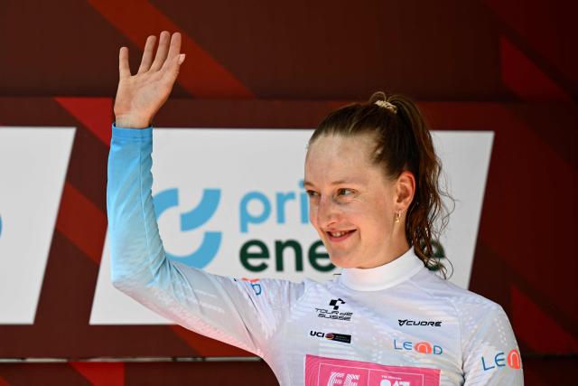 French rider Cedrine Kerboal of team EF Education Oatly (third) wearing the white jersey, poses on the podium of the first stage of the Women's Tour of Switzerland (Tour de Suisse) cycling race, in Sondrio, Italy, on June 17, 2026. (Photo by Marco BERTORELLO / AFP)