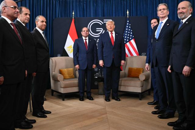 Egypt's President Abdel Fattah El-Sisi (C-L) and US President Donald Trump (C-R) attend a bilateral meeting on the sidelines of the G7 summit, in Evian, eastern France, on June 17, 2026. A G7 summit is set to take place June 15 to 17 in the French town of Evian-les-Bains near Switzerland and it will be attended by country leaders as well as the EU's foreign policy chief and ministers from Brazil, Canada, the United Arab Emirates and Turkey. (Photo by Mandel NGAN / AFP)