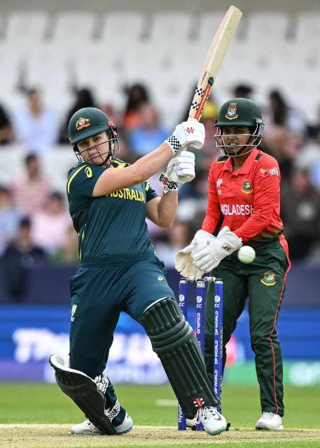 Australia's Georgia Voll (L) plays a shot during the ICC Women's T20 cricket world cup 2026 game between Australia and Bangladesh, at Headingley in Leeds, northern England on June 17, 2026. (Photo by Oli SCARFF / AFP)