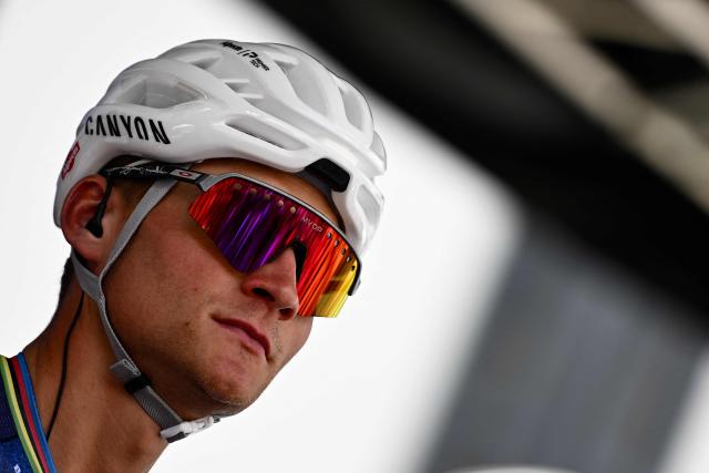 Mathieu van der Poel of team Alpecin-Premier Tech stands on stage before the first stage of the Men's Tour of Switzerland (Tour de Suisse) cycling race, in Sondrio, Italy, on June 17, 2026. (Photo by Marco BERTORELLO / AFP)
