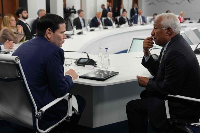US Secretary of State Marco Rubio (L) talks to European Council President Antonio Costa during a working lunch meeting of G7 members, partner countries, and artificial intelligence business leaders as part of the G7 summit, in Evian, eastern France, on June 17, 2026. A G7 summit is set to take place June 15 to 17 in the French town of Evian-les-Bains near Switzerland and it will be attended by country leaders as well as the EU's foreign policy chief and ministers from Brazil, Canada, the United Arab Emirates and Turkey. (Photo by Julia Demaree Nikhinson / POOL / AFP)