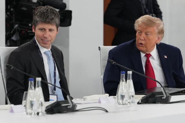 US President Donald Trump (R) and Open AI CEO Sam Altman (L) react during a working lunch meeting of G7 members, partner countries, and artificial intelligence business leaders as part of the G7 summit, in Evian, eastern France, on June 17, 2026. A G7 summit is set to take place June 15 to 17 in the French town of Evian-les-Bains near Switzerland and it will be attended by country leaders as well as the EU's foreign policy chief and ministers from Brazil, Canada, the United Arab Emirates and Turkey. (Photo by Julia Demaree Nikhinson / POOL / AFP)