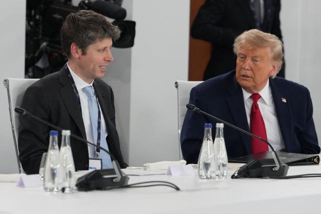 US President Donald Trump (R) and Open AI CEO Sam Altman (L) react during a working lunch meeting of G7 members, partner countries, and artificial intelligence business leaders as part of the G7 summit, in Evian, eastern France, on June 17, 2026. A G7 summit is set to take place June 15 to 17 in the French town of Evian-les-Bains near Switzerland and it will be attended by country leaders as well as the EU's foreign policy chief and ministers from Brazil, Canada, the United Arab Emirates and Turkey. (Photo by Julia Demaree Nikhinson / POOL / AFP)