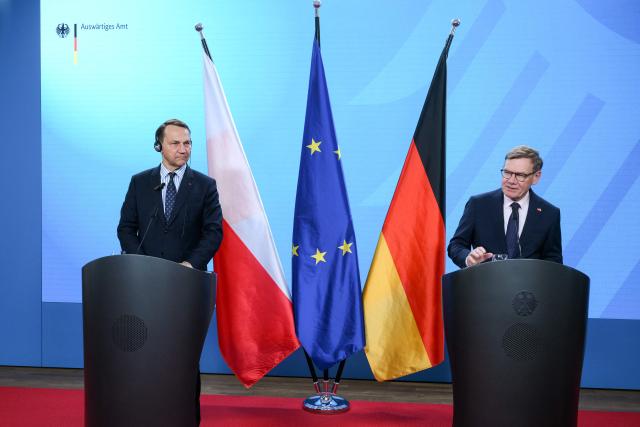 German Foreign Minister Johann Wadephul (R) and Polish Foreign Minister Radoslaw Sikorski address a joint press conference on the sidelines of the German-Polish Forum at the Foreign Ministry in Berlin on June 17, 2026. (Photo by RALF HIRSCHBERGER / AFP)