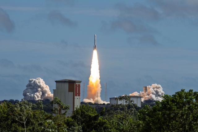 Arianespace's Ariane 6 rocket equipped for the first time with four P160C boosters, carrying a paylaod of 36 satellites from Amazon’s Leo constellation as part of Flight VA269, at the Guiana Space Centre in Kourou, on the French overseas department of Guiana on June 17, 2026. (Photo by RONAN LIETAR / AFP)