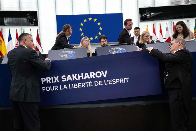 European Parliament ushers set up a board reading "Sakharov Prize, for freedom of thought" at the European Parliament in Strasbourg, eastern France, on June 17, 2026. The EU parliament awarded the bloc's Sakharov human rights prize on October 22, 2025 to jailed Georgian journalist and editor Mzia Amaghlobeli and Polish-Belarusian journalist Andrzej Poczobut, calling them symbols of the "struggle for freedom". (Photo by SEBASTIEN BOZON / AFP)