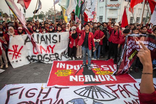 University students take part in a protest demanding an investigation into corruption in the government's Free Nutritious Meals programme (MBG), lower fuel prices and economic stability, in Yogyakarta on June 17, 2026. (Photo by DEVI RAHMAN / AFP)