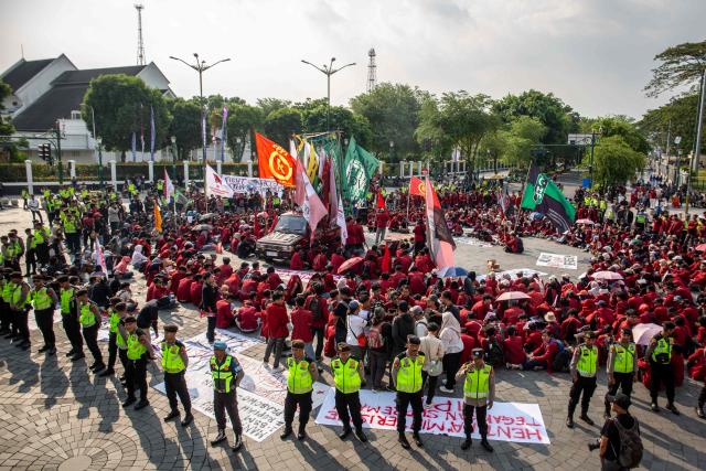 University students take part in a protest demanding an investigation into corruption in the government's Free Nutritious Meals programme (MBG), lower fuel prices and economic stability, in Yogyakarta on June 17, 2026. (Photo by DEVI RAHMAN / AFP)